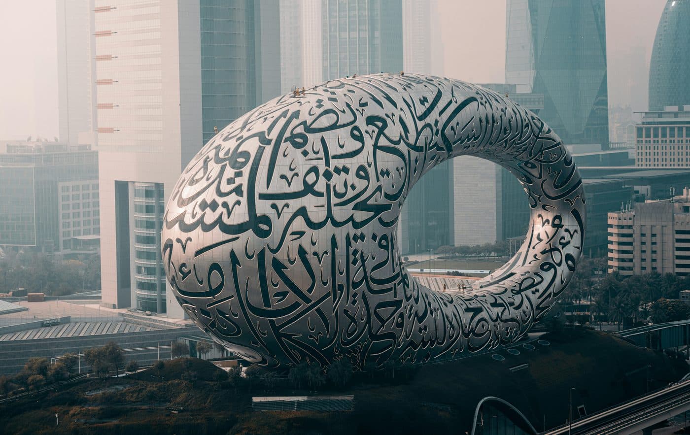 The Museum of the Future's Arabic-calligraphy façade rising above the Dubai skyline